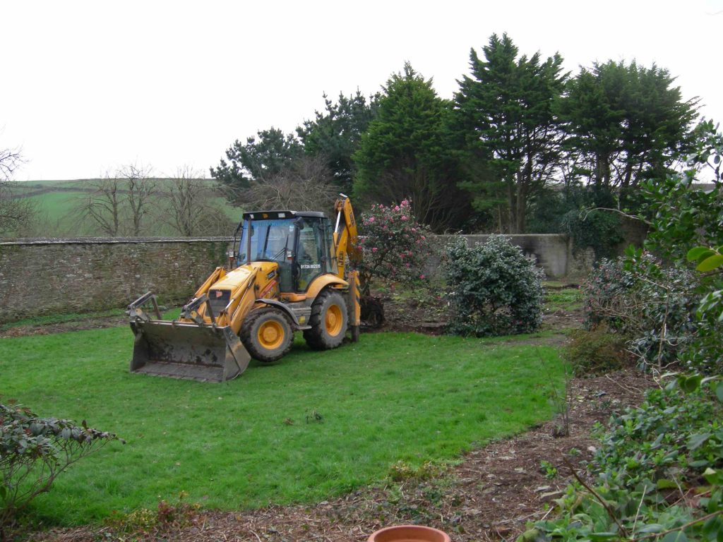 Clearing with a digger